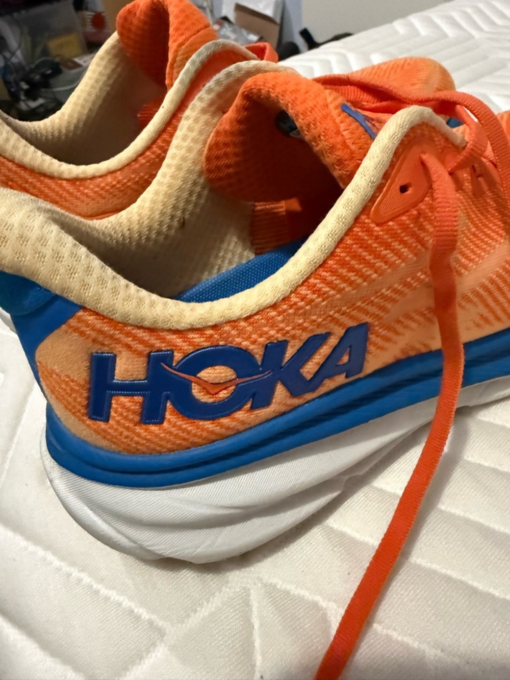 Hoka men’s Orange and Blue Athletic Sneakers